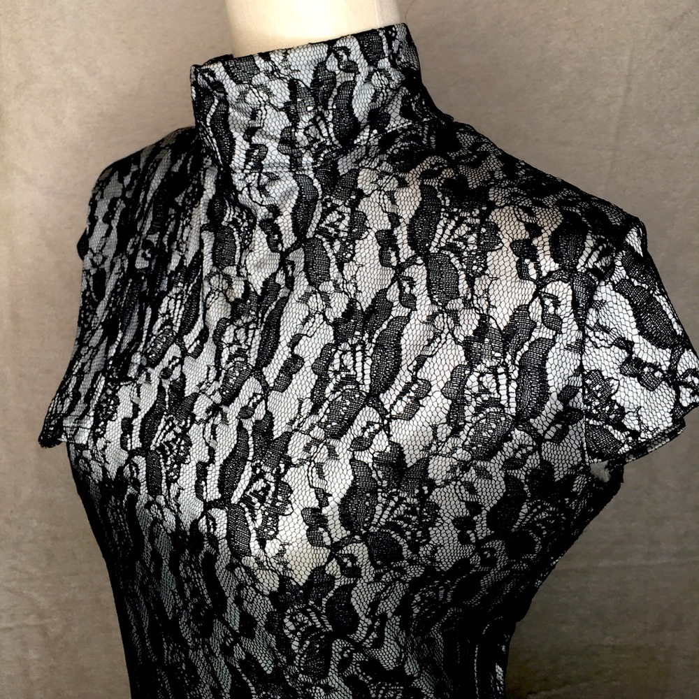 Gorgeous bodycon laced effect silver cocktail dress.